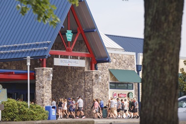 051_070619_PTC Large group walking into service plaza entrance